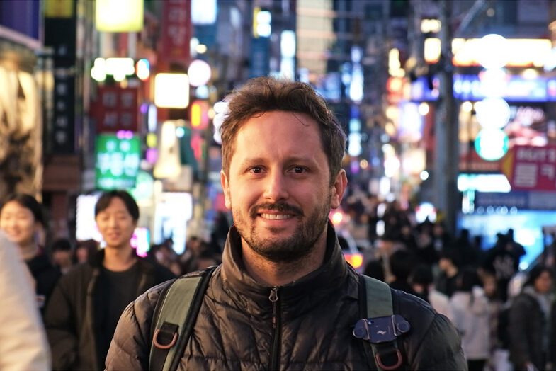 Benoit in a Neon Lit Street